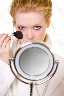 Putting on makeup