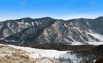 Peak of mountain and blue sky.