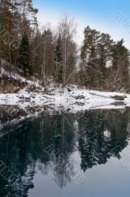 Nonfreezing Blue lake in Mountain Altai. Siberia.