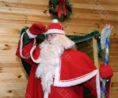 Santa Claus near wooden door