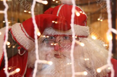 Santa Claus looking through window