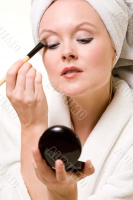Putting on makeup