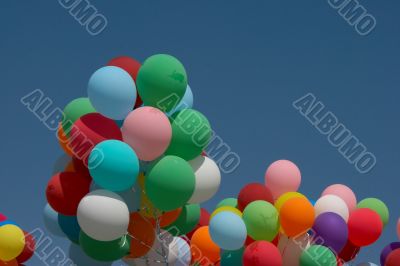 Countless colorful balloons in deep blue sky