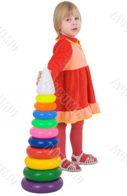 Girl in the red dress with toy