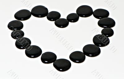 heart with a black stones