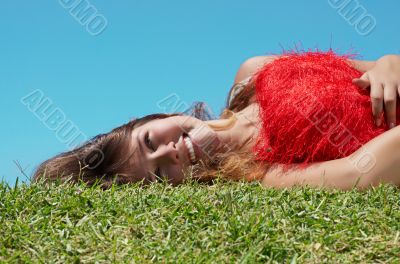 Girl lies on the grass