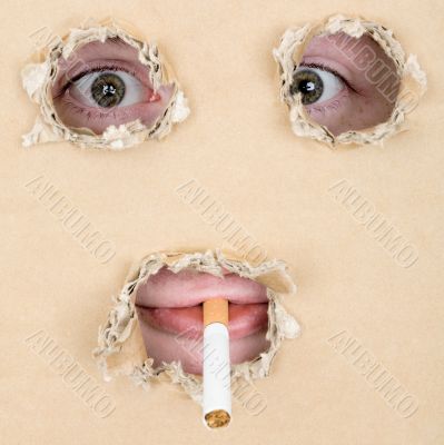 Mug smoking a cigarette