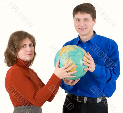 Man and woman hold globe