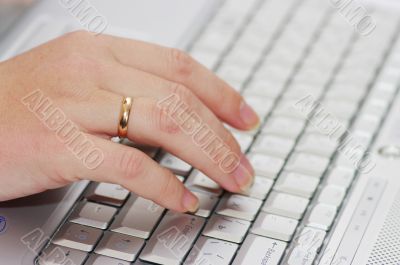 Closeup of a hands typing on the keyboard