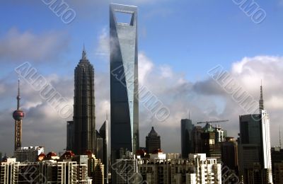 Shanghai`s skyline in the clouds