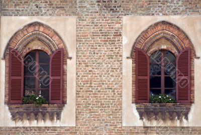 Lodi - Two windows of an ancient palace