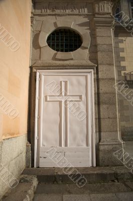 white door with cross