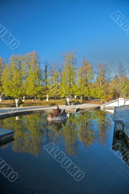 small lake with statues
