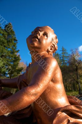 red boy statue
