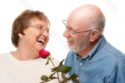 Happy Senior Couple with Red Rose