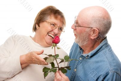 Happy Senior Couple with Red Rose