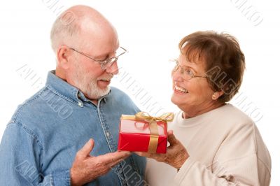 Happy Senior Couple with Gift