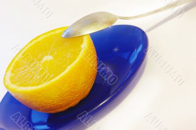 some oranges and a soon on a plate