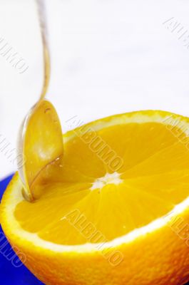 some oranges and a soon on a plate