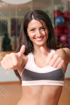 The beautiful girl in sports club