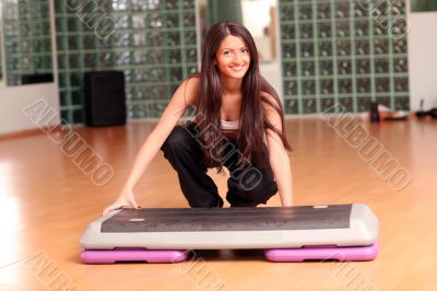 The beautiful girl in sports club