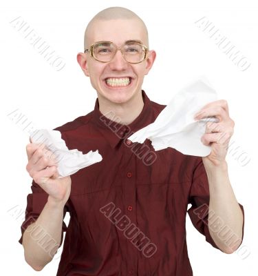 Man tear to pieces paper