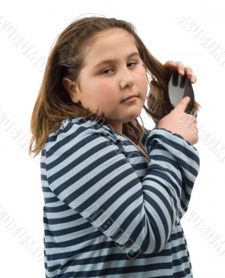 Child Brushing Her Hair