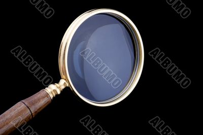 magnifying glass on black closeup
