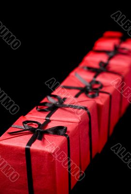 red gift boxes on black