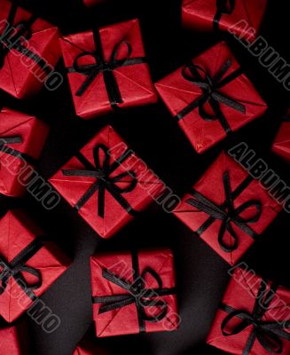 red gift boxes on black