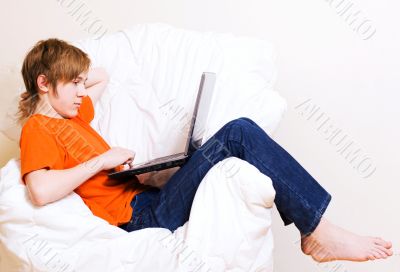 The teenager in an orange t-short