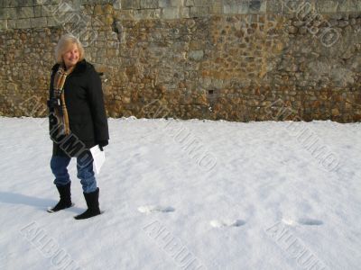 Woman walking in the snow