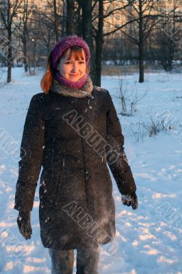 Young girl smiling in winter clothes