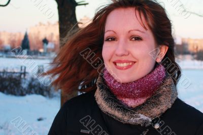 Young girl smiling in winter