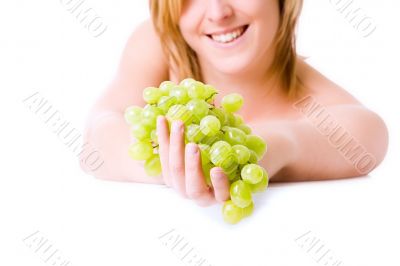 Hand with grapes