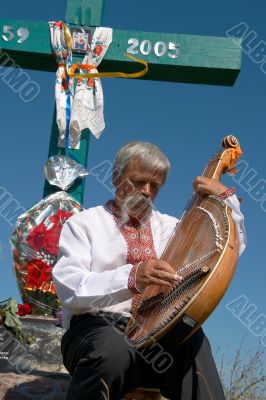 Senior ukrainian musician with bandura