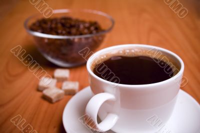 cup of coffee, sugar and beans