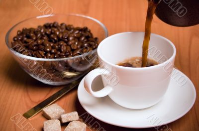 cup of coffee, sugar and beans