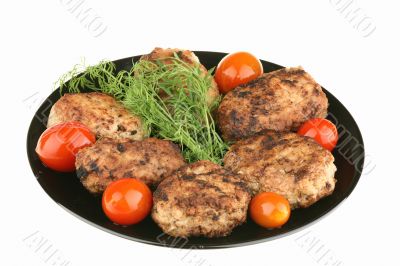 Cutlets and tomatoes