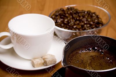 cup, coffee, sugar and beans in glass bowl
