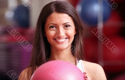 The beautiful girl with a sphere