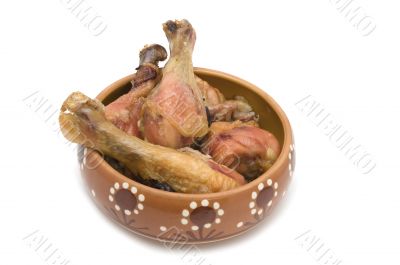 chicken leg in dish close up