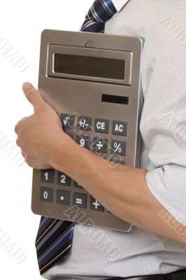 Businessman with gigantic pocket calculator
