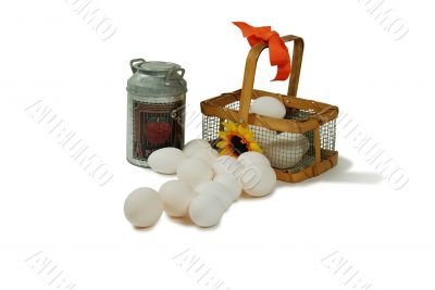 Wire basket eggs and milk tin