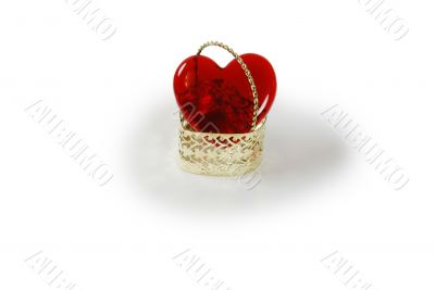 Metal basket with glass heart