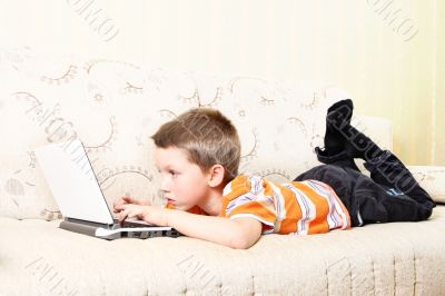 Small kid with laptop