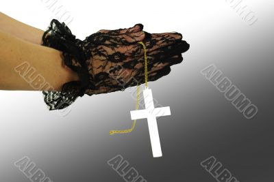 Praying hand with gold cross