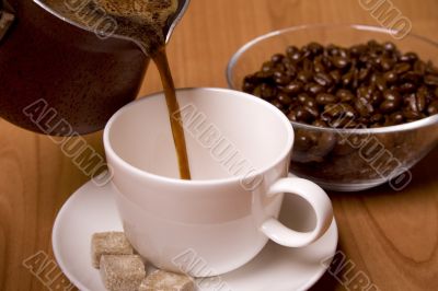 cup of coffee, sugar and beans