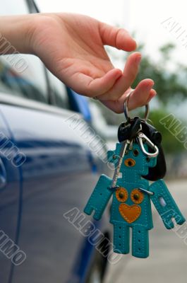 Holding car key