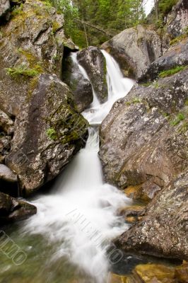 A waterfall is in the Ural mountains 1